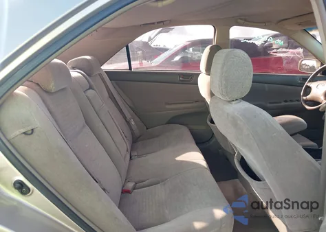 2004 Toyota Camry Le z USA, uszkodzony, nr VIN JTDBE32K540297668